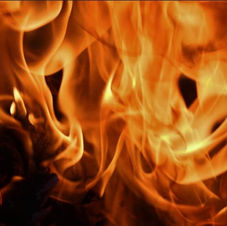 Macro therapeutic photography of orange flames, representing the inner resilience and energy of youth in Northern Saskatchewan.