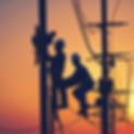 electricians working sunset.jpg