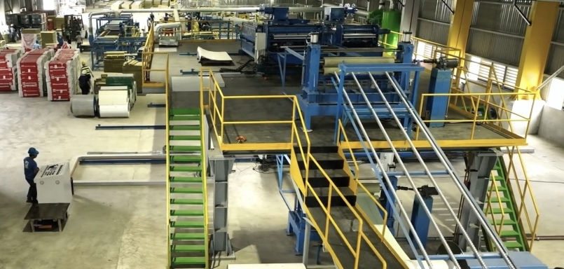 Sandwich Panel Line Roll Forming Machine showing 1st and 2nd floor equipment – High precision steel panel production by DongHae MMC