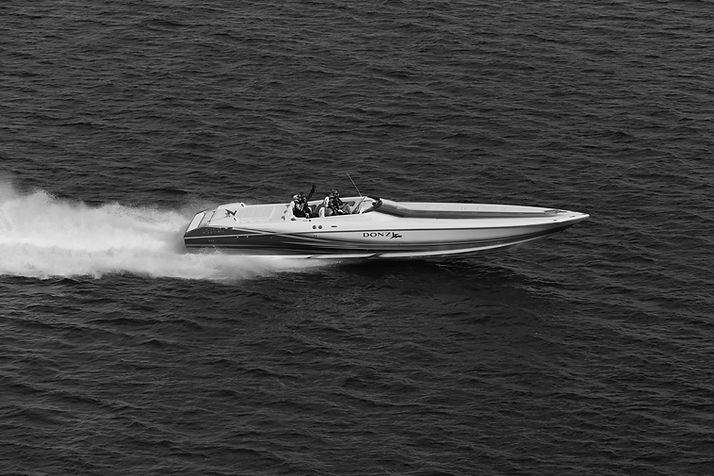 white and red boat on water during daytime_edited.jpg