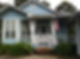 Front porch with curtains