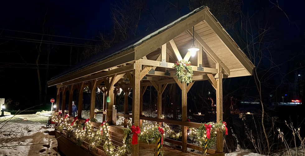 covered bridge with holiday decorations
