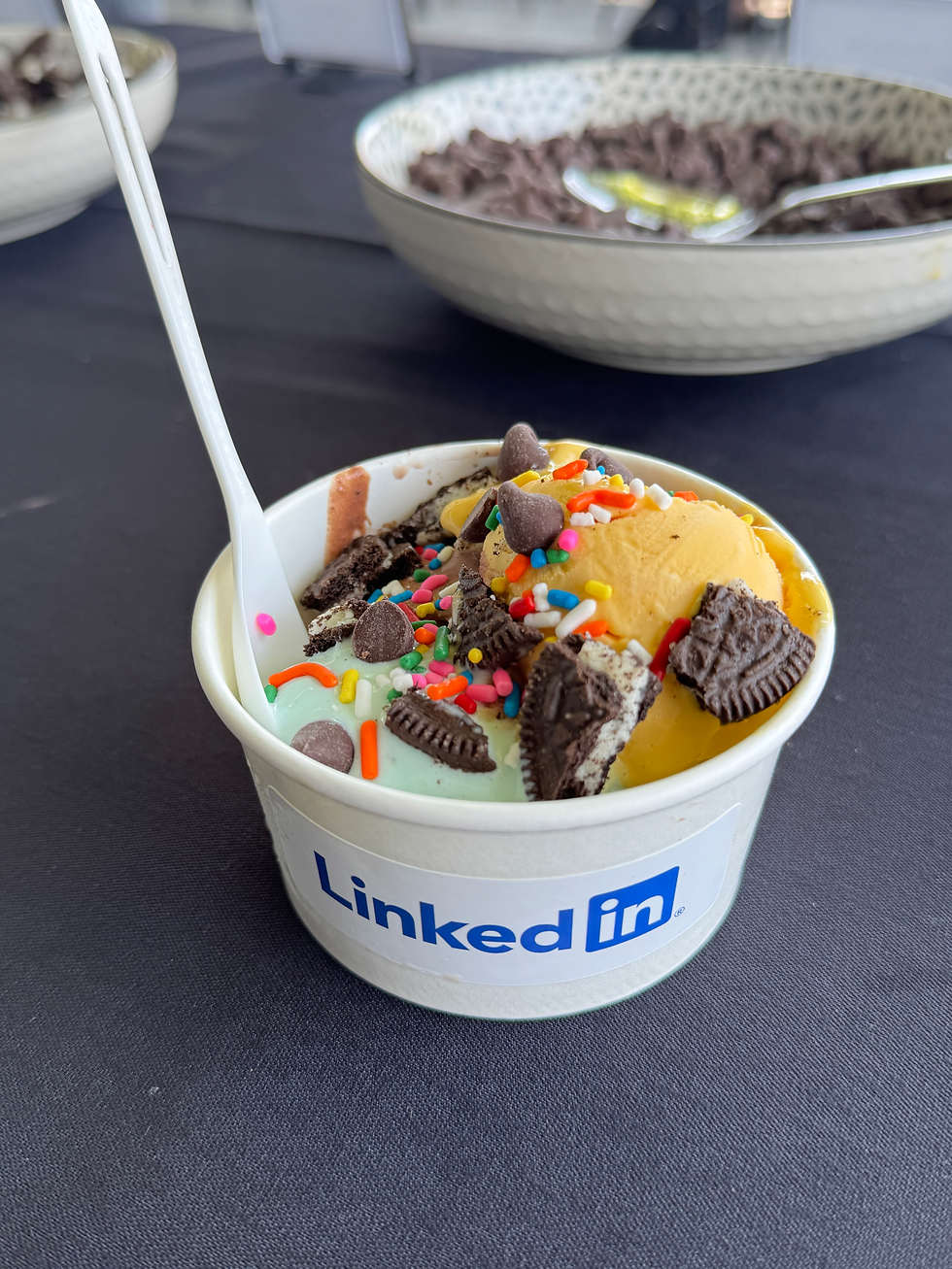 Ice Cream sundae with mango ice cream, cookie monster ice cream, cookies, and sprinkles.
