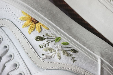 Old skool shoes with sunflowers and leaves