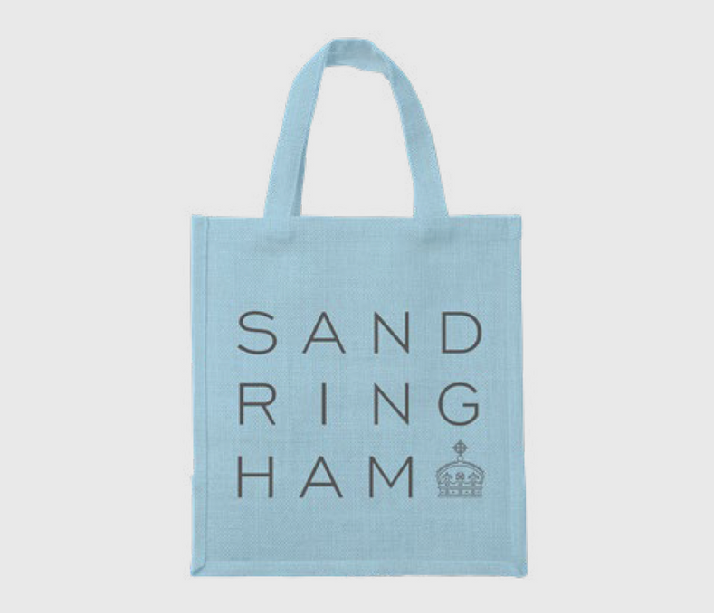 A photograph of a blue hessian bag with Sandringham's branding inplace