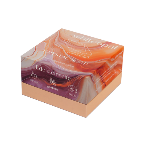 Verpackung der White Opal-Seife von LA BELLE SAVON ®, elegant gestaltet, mit Duft von Pfirsich, Gardenien und Moos.