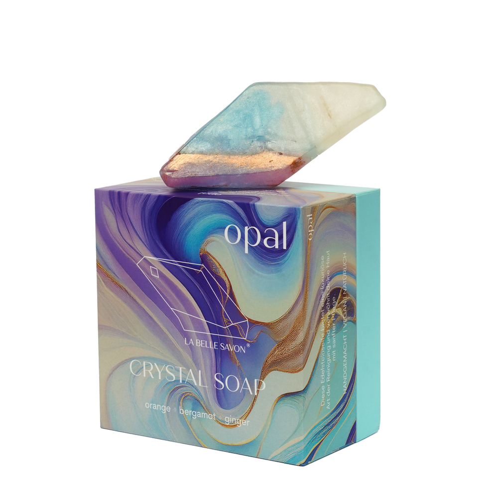 Opal-Edelsteinseife von LA BELLE SAVON® auf edler Verpackung, mit echtem Opal und Duft nach Orange, Bergamotte und Ingwer.