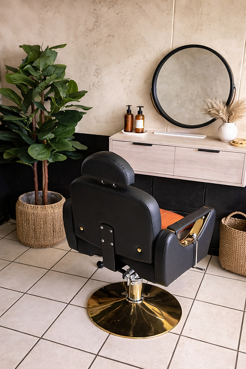 Modern salon corner with gold accents.png