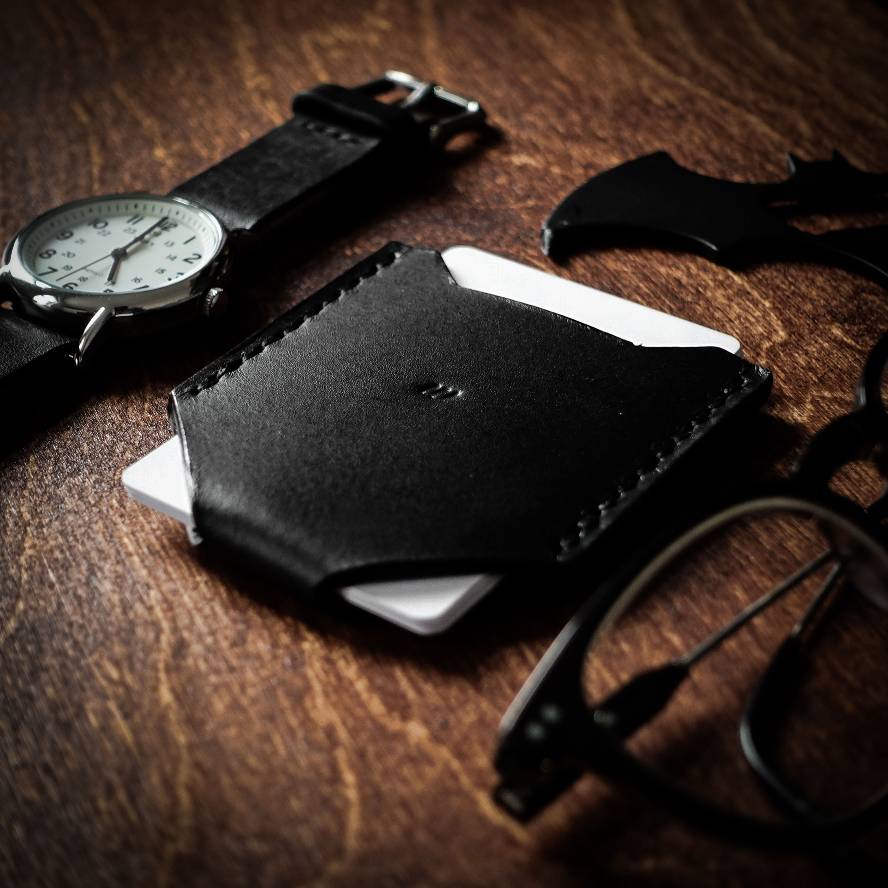 Black leather guardian card holder handmade by Geoff Wilde of Wilde's Leatherwork in Blackburn Lancashire England UK