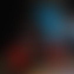 Alternative wedding flowers styled in a bold, sculptural floral installation using vibrant colours and non-traditional textures