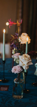 Alternative wedding styling UK, Rock n’ Roll wedding, Gothic wedding decor, Moody wedding aesthetic, Edgy bridal style, Till Death Do Us Part theme, Dark romance wedding, Unconventional wedding stylist, Bold wedding colours, Modern gothic wedding, Black tapered candles, Checkered wedding decor, Velvet wedding linens, Neon wedding signs, Industrial wedding venue, Black wedding dress, Biker jacket bride, Skull wedding details, Deep red floral design, Dark autumnal wedding flowers, Vintage suitcase decor, UK alternative wedding planner, Creative wedding stylist London, Industrial warehouse wedding UK, Quirky wedding decor hire, Edgy UK wedding inspiration, Non-traditional wedding ideas, Gothic ceremony styling, Textured floral arrangements, Moody banquet table.