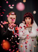 alternative wedding decor, alternative wedding stylists, pink and orange wedding styling, The Shack Revolution wedding venue, bold colourful wedding flowers, Streamadelica ceiling streamers, rockstar wedding welcome sign, burgundy and peach wedding colours, non-traditional wedding design, vibrant wedding photography UK