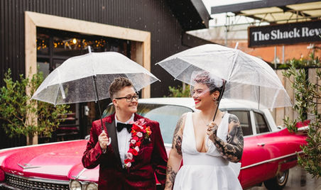 alternative wedding stylist, non traditional wedding styling, alternative wedding inspiration, Vegas wedding inspiration, bold wedding decor, maximalist wedding design, creative wedding styling, editorial wedding shoot, unconventional wedding ideas, rock and roll wedding aesthetic, modern wedding decor, wedding tablescape design, statement wedding backdrop, neon wedding sign, Love You to Death neon, red heart backdrop wedding, sculptural wedding florals, luxury wedding flowers, disco ball wedding decor, checkerboard plinth styling, industrial wedding venue, The Shack Revolution wedding, contemporary wedding design, unique wedding ideas, wedding styling inspiration, dramatic wedding decor, design led wedding concept, wedding reception decor inspiration, alternative wedding collective, modern couple wedding inspiration