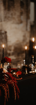 Alternative wedding styling UK, Rock n’ Roll wedding, Gothic wedding decor, Moody wedding aesthetic, Edgy bridal style, Till Death Do Us Part theme, Dark romance wedding, Unconventional wedding stylist, Bold wedding colours, Modern gothic wedding, Black tapered candles, Checkered wedding decor, Velvet wedding linens, Neon wedding signs, Industrial wedding venue, Black wedding dress, Biker jacket bride, Skull wedding details, Deep red floral design, Dark autumnal wedding flowers, Vintage suitcase decor, UK alternative wedding planner, Creative wedding stylist London, Industrial warehouse wedding UK, Quirky wedding decor hire, Edgy UK wedding inspiration, Non-traditional wedding ideas, Gothic ceremony styling, Textured floral arrangements, Moody banquet table.