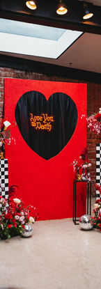 Alternative wedding styling UK, Rock n’ Roll wedding, Gothic wedding decor, Moody wedding aesthetic, Edgy bridal style, Till Death Do Us Part theme, Dark romance wedding, Unconventional wedding stylist, Bold wedding colours, Modern gothic wedding, Black tapered candles, Checkered wedding decor, Velvet wedding linens, Neon wedding signs, Industrial wedding venue, Black wedding dress, Biker jacket bride, Skull wedding details, Deep red floral design, Dark autumnal wedding flowers, Vintage suitcase decor, UK alternative wedding planner, Creative wedding stylist London, Industrial warehouse wedding UK, Quirky wedding decor hire, Edgy UK wedding inspiration, Non-traditional wedding ideas, Gothic ceremony styling, Textured floral arrangements, Moody banquet table.