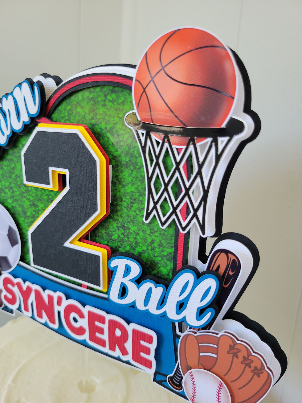 Thumbnail: Cake topper in sports design showing basketball, baseball, football and soccer ball
