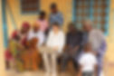 013 Ouaga Lougue family & Nina look at footage.JPG
