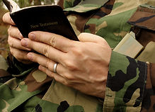 american soldier's hands in uniform read