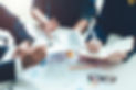 Asian business adviser meeting to analyze and discuss the situation on the financial repor
