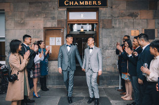 Dennis and Derek holding hands outside City Chambers Edinburgh