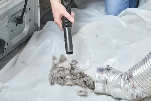 how-to-clean-a-dryer-vent_vacuum-hose-650x433.webp