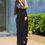 Thumbnail: Black Solid Flower Embroidered Bollywood Style Georgette Saree For Women