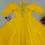 Thumbnail: Yellow Faux Georgette Gown With Big Flair and Fancy Neck