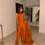 Thumbnail: A Girl in Orange Trendy Sadaf Kanwal Ready To Wear Kurti With Pant & Dupatta Salwar Suit Set