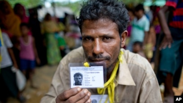 Muslim Refugee Receiving UNHCR Cards in Bangladesh (photocrd)