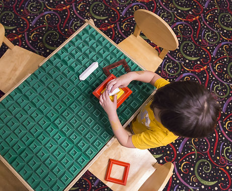 Boy Playing with Blocks