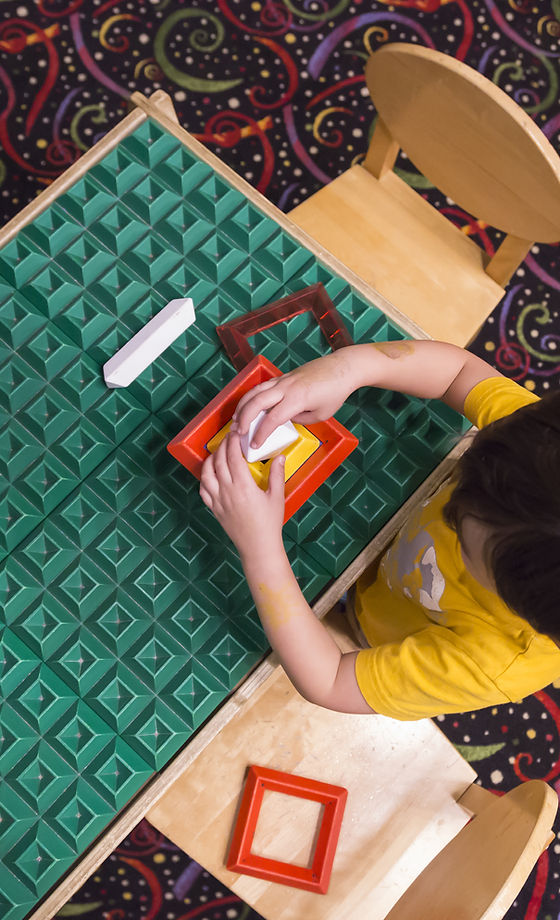 Boy Playing with Blocks