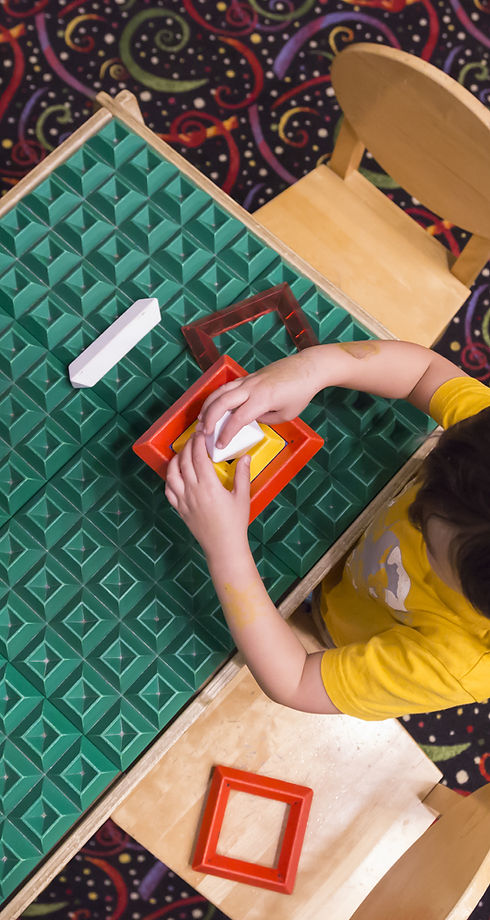 Boy Playing with Blocks