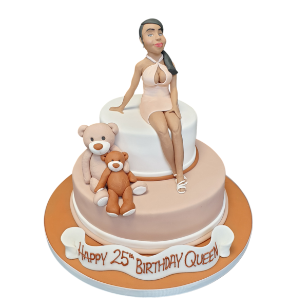 Adorable cake featuring a fondant lady and teddy bears as decoration, perfect for special occasions in UK.