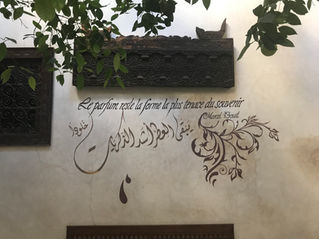 fancy writing on a white wall