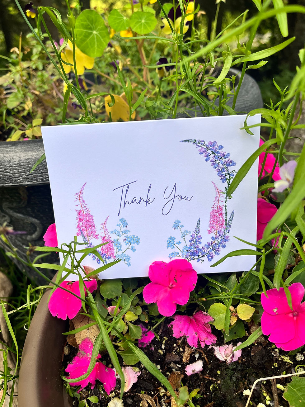 Thumbnail: floral thank you card sits by pink flowers