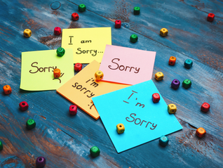 several post-its with "sorry"