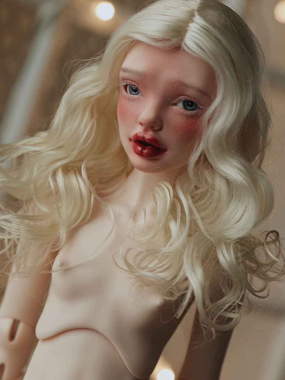 Handmade angora goat hair wig with medium-length curls.