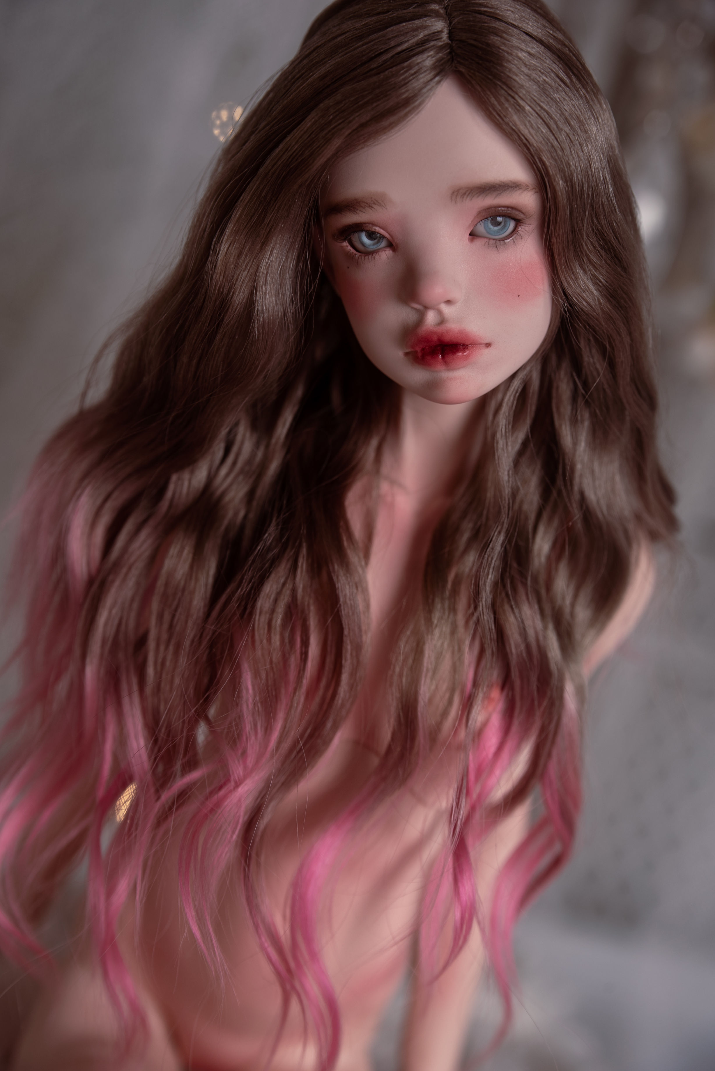 Handmade angora goat hair wig with long smooth waves.