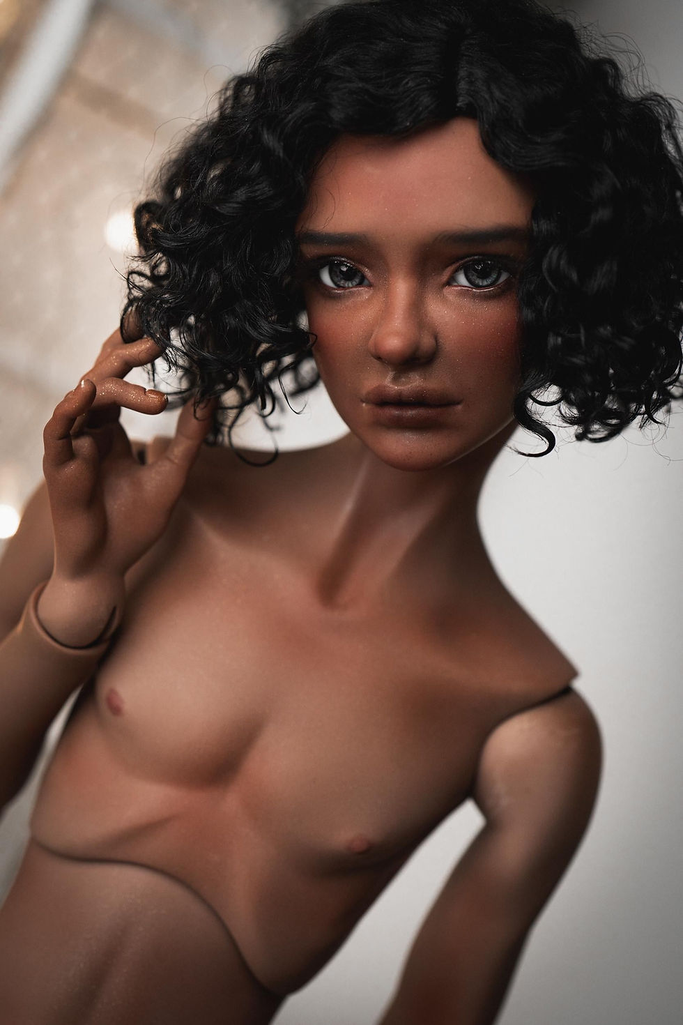 Thumbnail: Handmade angora goat hair wig with a short messy curly bob cut.