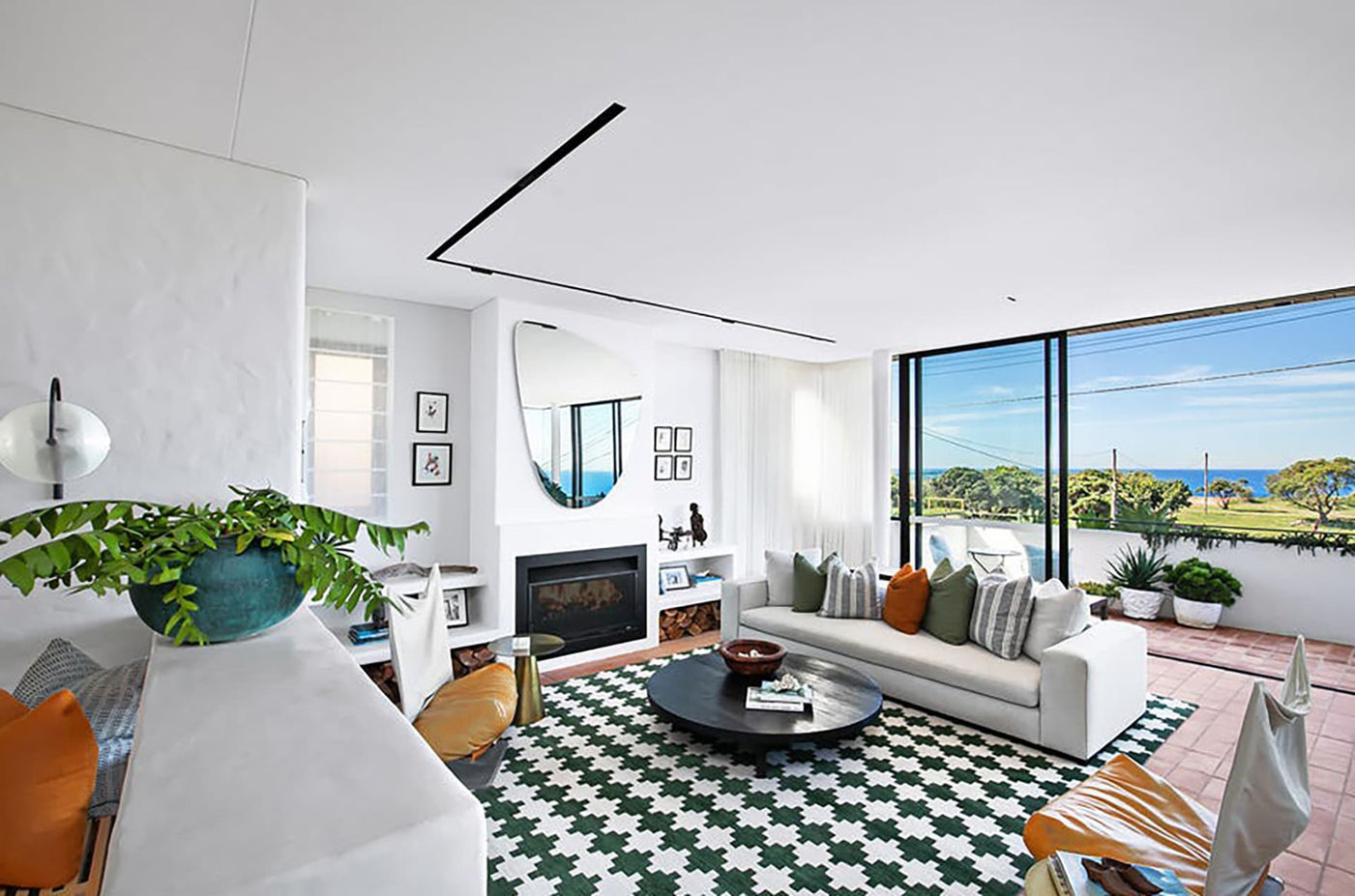 Modern coastal living room with ocean view