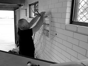 Licensed electrician from WA Sparkies rewiring a home during a full renovation in Perth