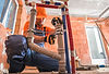 Plumber installing pipes during house construction