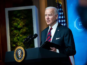 Biden Vows To Slash Us Emissions By Half