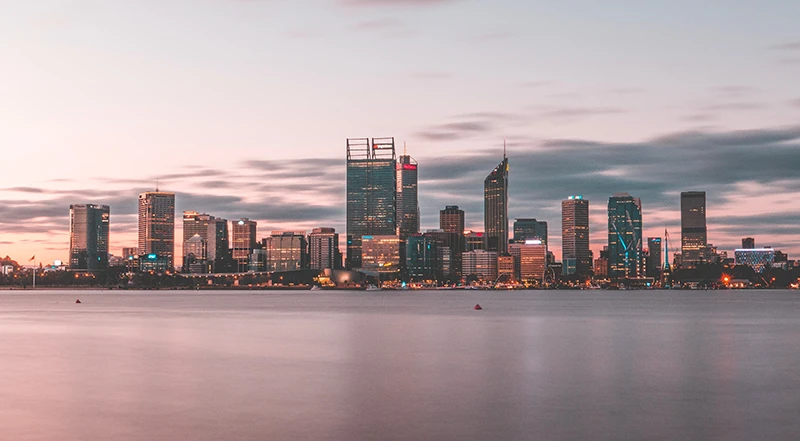 a city skyline by the water