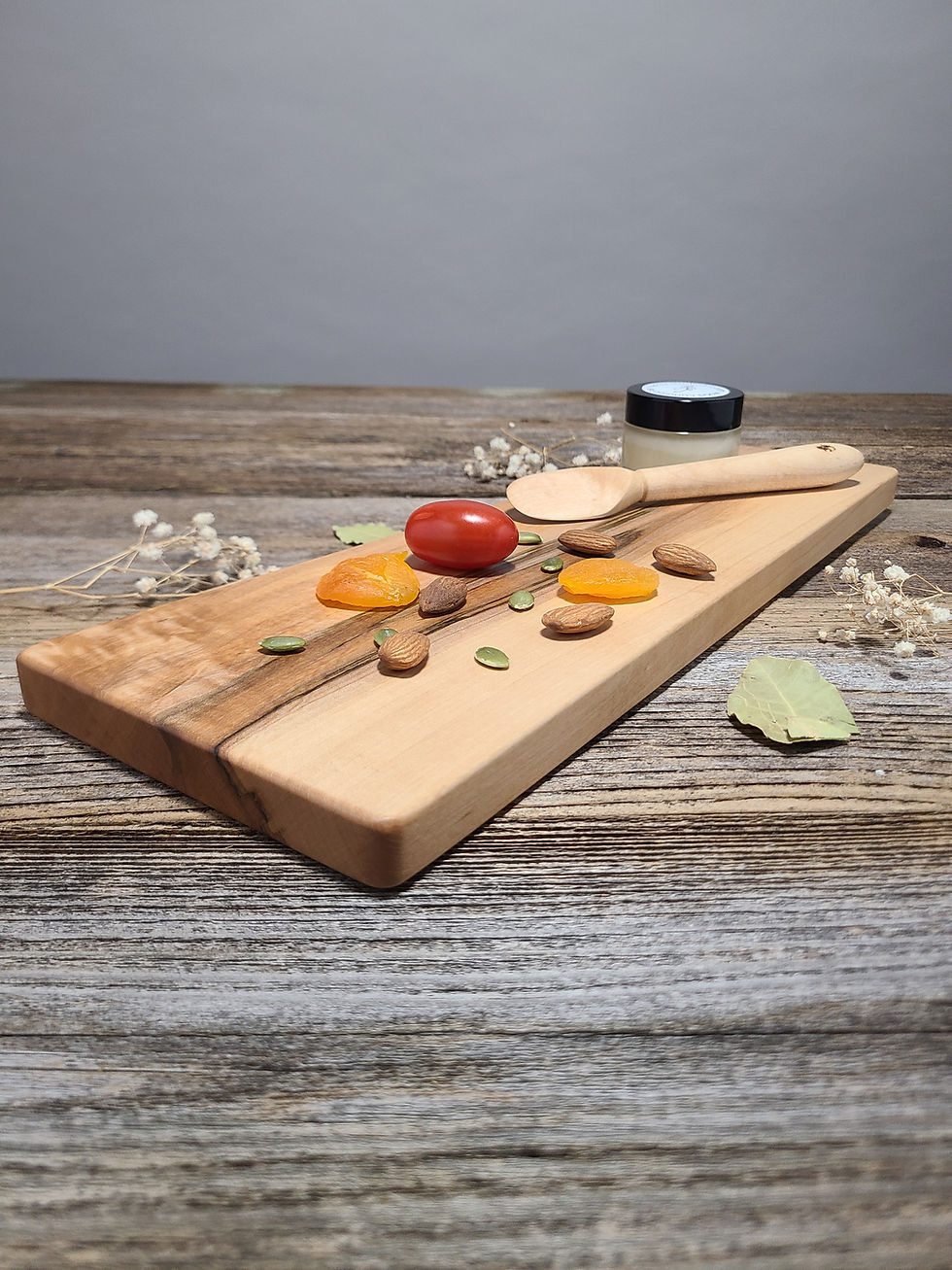 Thumbnail: Closeup of maple charcuterie board set with vertical grain — from Roberto Ferrer's limited holiday collection.