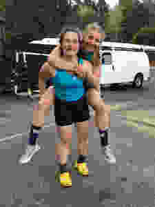 Seniors Renee Hopper and Nicole Winters before racing a double together at Burton Beach