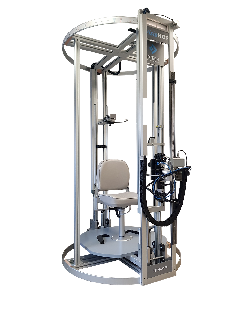 Tall metal positioning bench with a padded chair and circular frame, labeled VisioHOP and EOTECH, on a black background