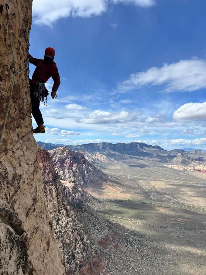 One of the author’s climbing companions on an escarpment in Red Rock National Recreation Area, Nevada. Photo courtesy of George Daniel Urioste