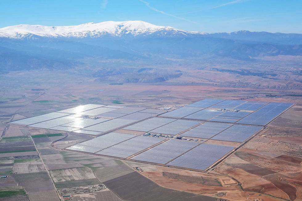 The 150 MW Andasol solar power station in Spain is a commercial parabolic trough solar thermal power plant. It uses tanks of molten salt to store solar energy to generate electricity even when the sun isn't shining. Photo: kallerna (CC BY-SA 4.0)