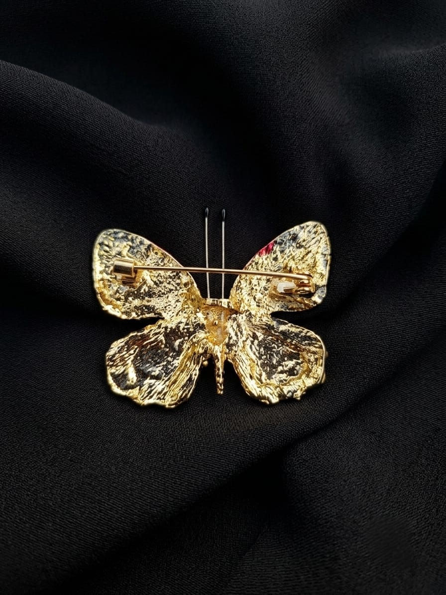 Miniature : Broche traditionnelle à pic sur support doré  Papillon rempli de strass   Noir et Fuchsia ou Fuchsia et orange